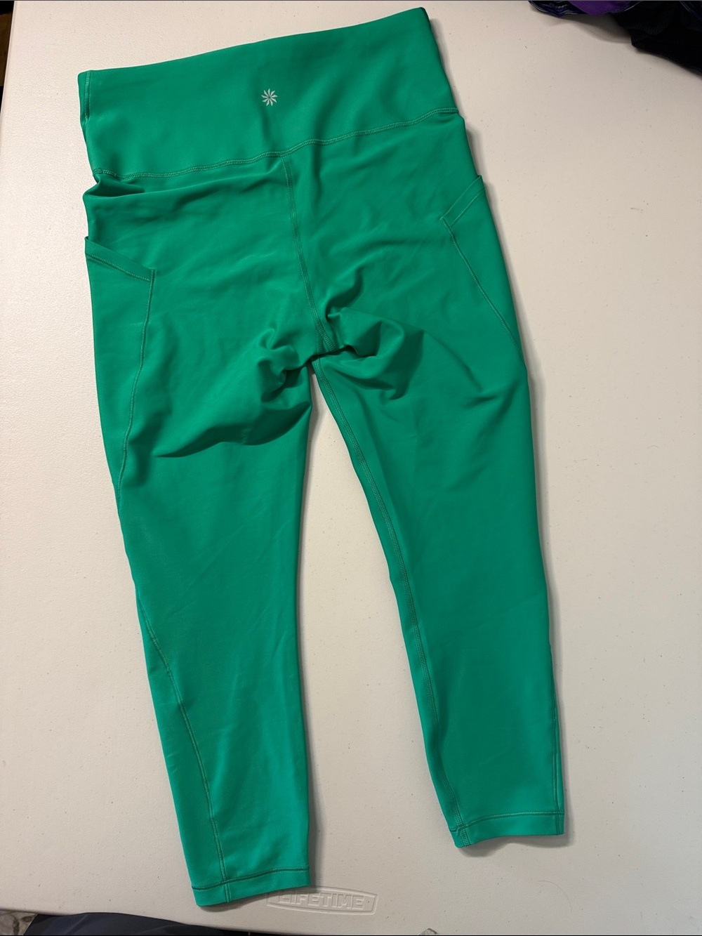 Athleta Interval Stash 7/8 Leggings with Pockets Bright Green size Medium